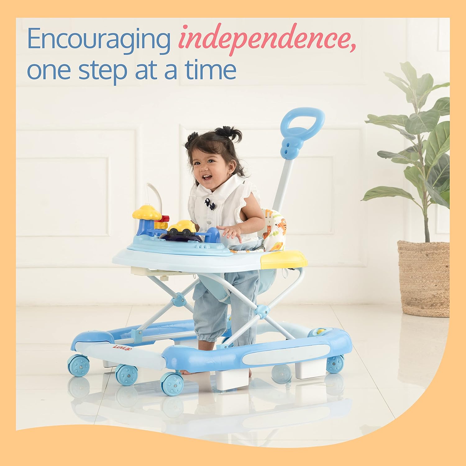 Front-facing view of a yellow and green baby walker with a patterned seat, a green parent handle, and multi-colored activity toys on its tray. www.usmile.toys